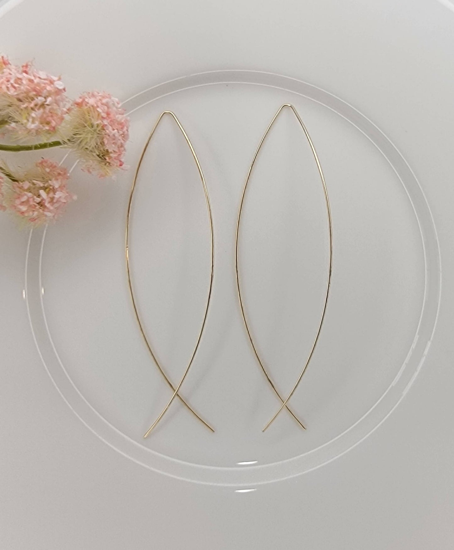 FISH SHAPED LONG WIRE HOOP EARRINGS.