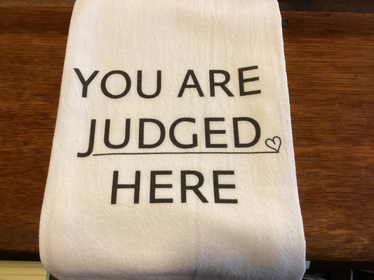 You are Judged Here Tea Towel