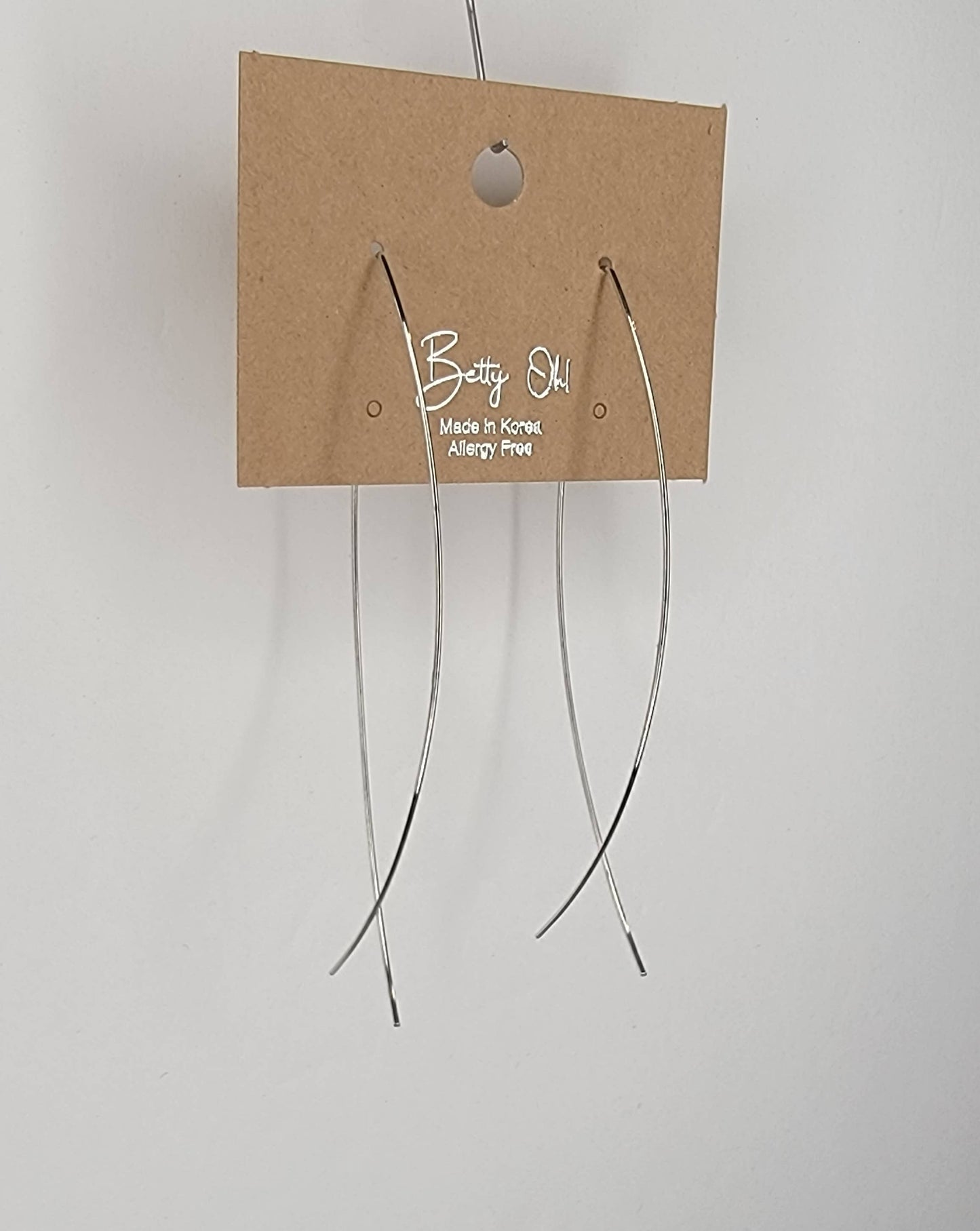 FISH SHAPED LONG WIRE HOOP EARRINGS.