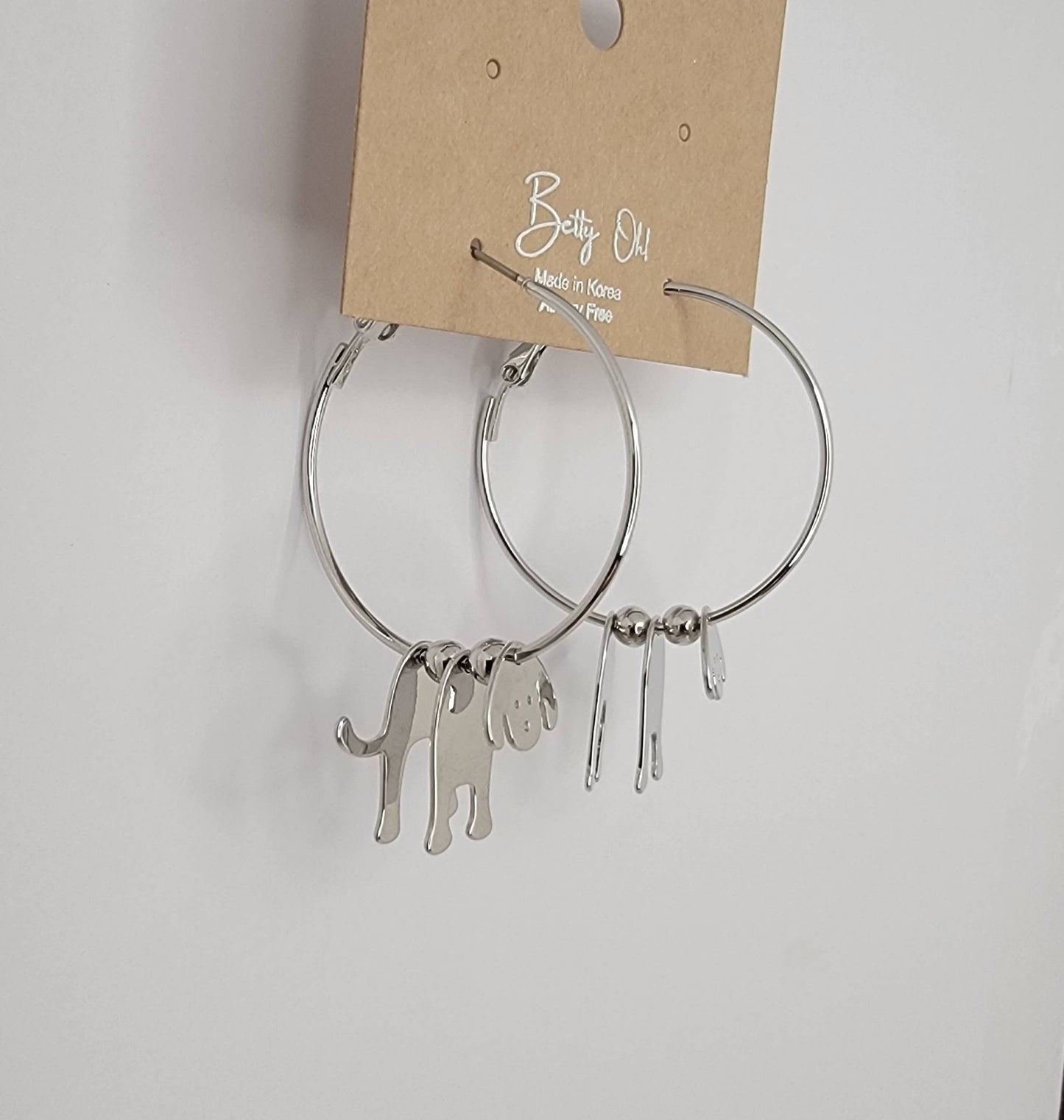 3D DOG HOOP EARRINGS.